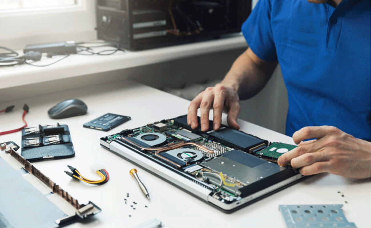 In-store laptop repair services by Quick Fix Computer Services fixing damaged computer hardware located in Bay Area, Mountain View